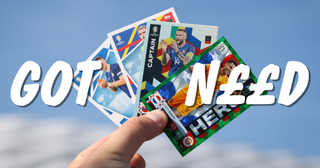 A hand holding four fanned out football cards with the words &#039;GOT, GOT, NEED&#039; over the top