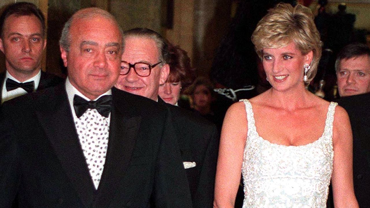 Mohamed Al-Fayed in a tuxedo and Princess Diana wearing a white evening gown