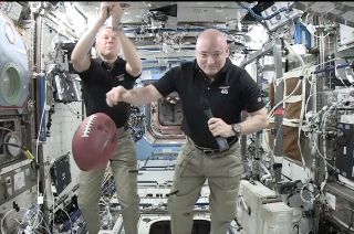 Astronaut Scott Kelly and super bowl football