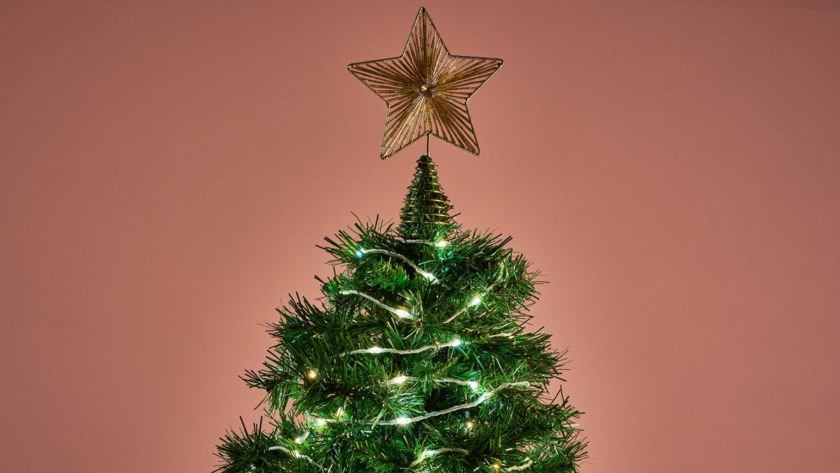 The Govee Christmas String Lights 2 are glowing white on a Christmas tree.