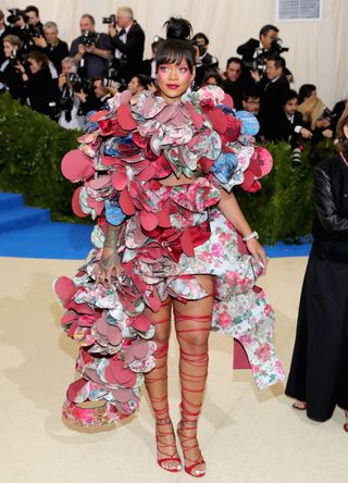 Rihanna in a large floral fabric dress