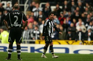 Emre leaves the pitch after being sent off while playing for Newcastle United against Stoke City in 2008