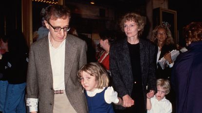 Woody Allen (L) w. Dylan Farrow (2L) and her mother, actress Mia Farrow (2R), and Allen and Farrow's son Satchel (R).