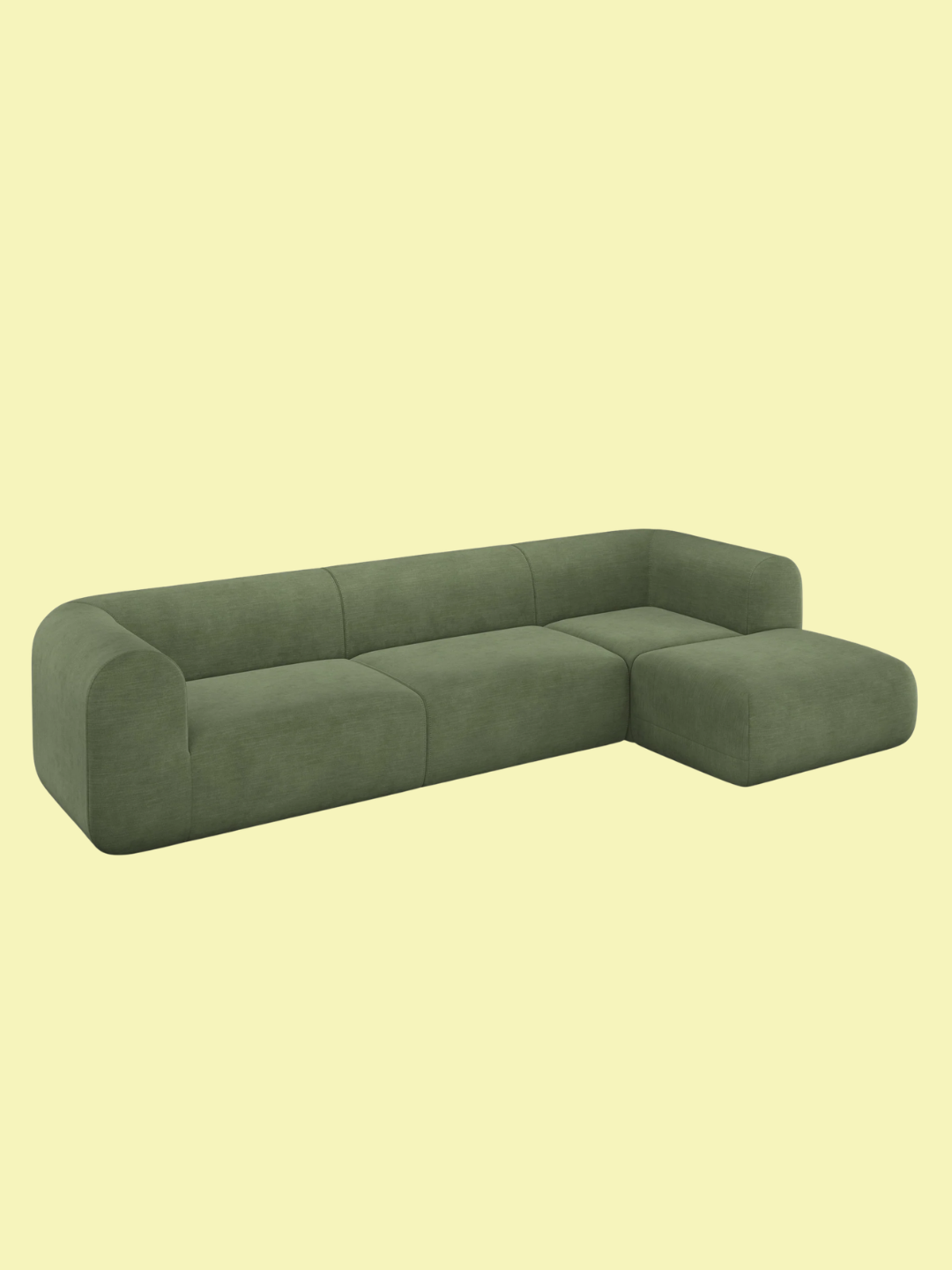 A green three-seater chaise from Tom Dixon