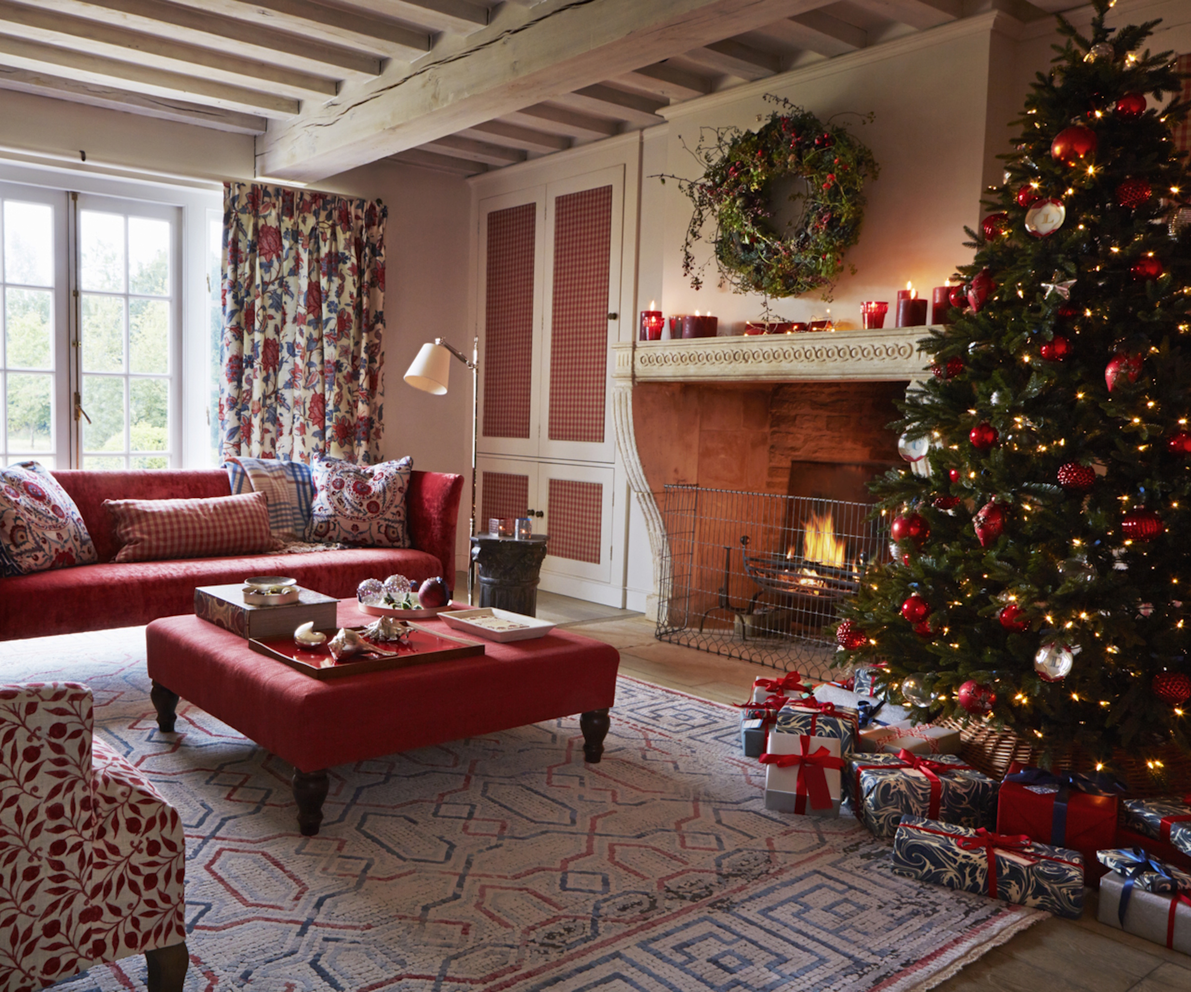 Christmas tree by fireplace