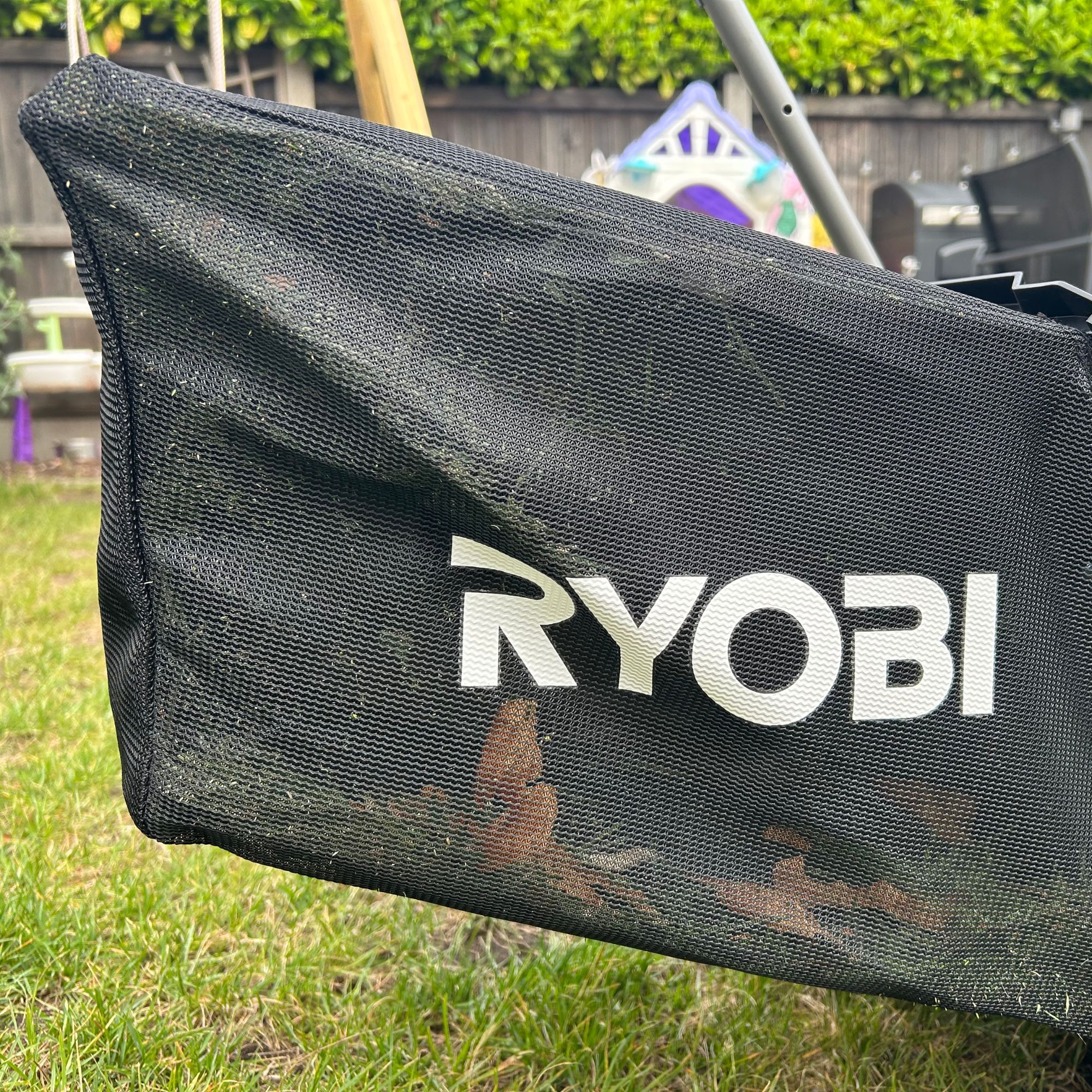 Ryobi lawnmower grass box close up