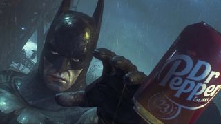 Batman reaches out, yearningly, for a can of Dr Pepper in Arkham Knight.