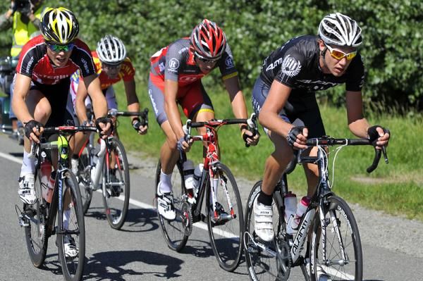 Four riders have broken away on the first lap, led by Roman van Uden of Pure Black Racing.
