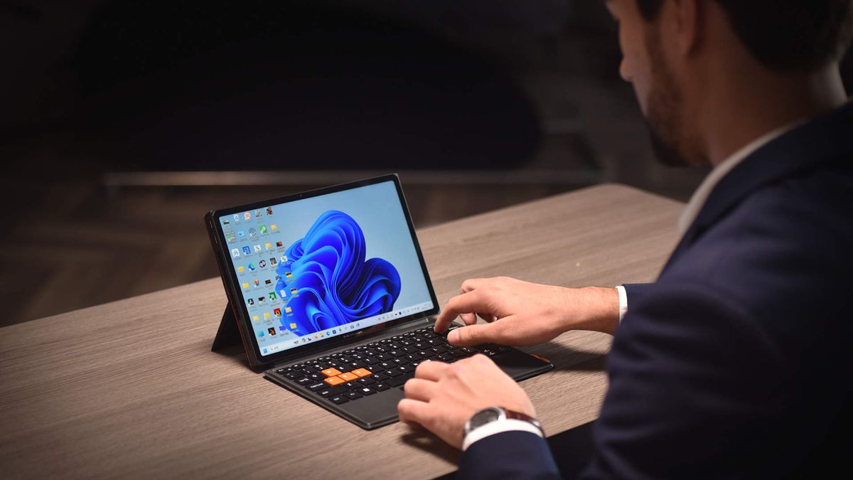 Promotional images for the OneXPlayer X1 portable PC