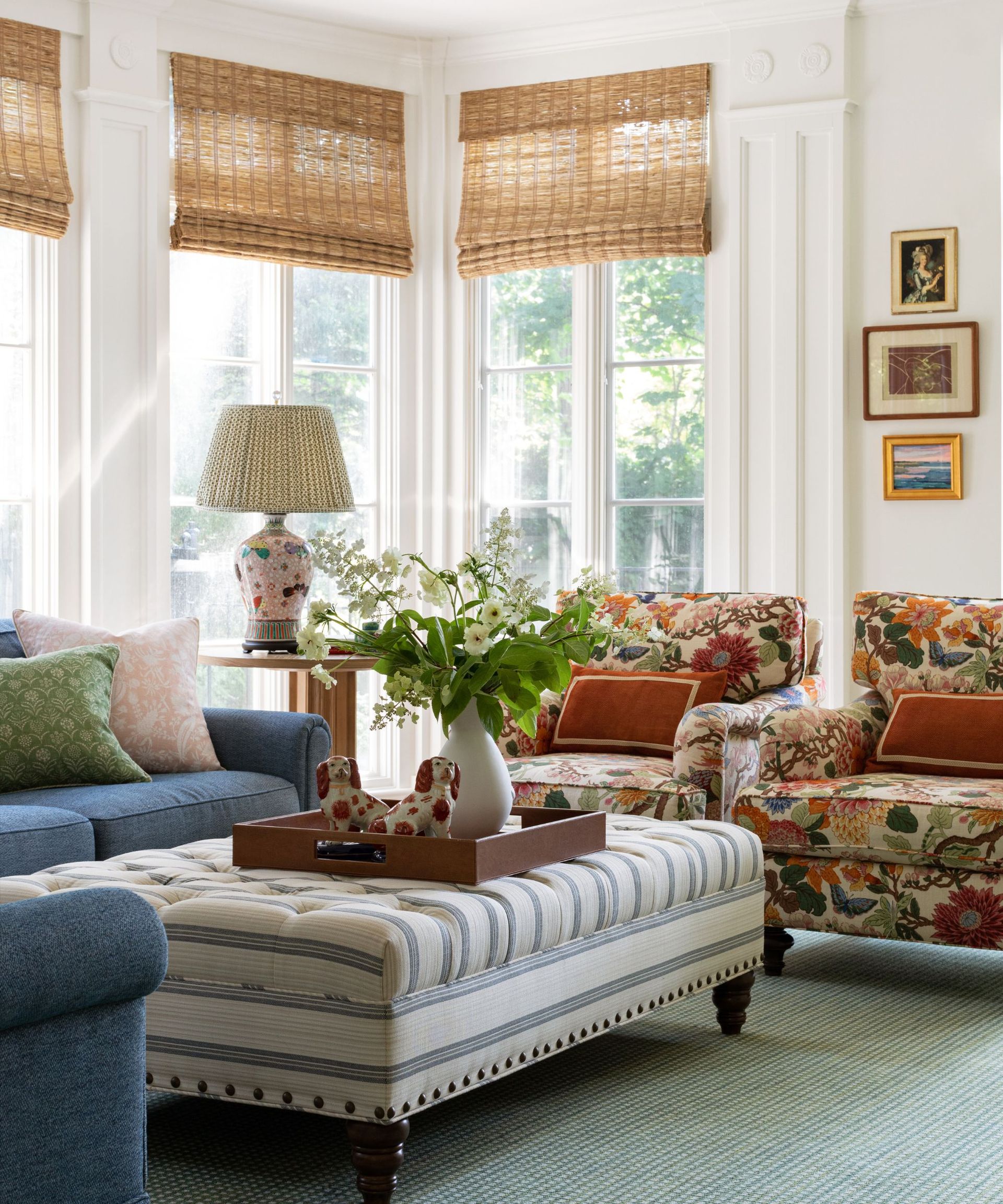 sun room with vintage floral furniture and decor accessories and natural bamboo blinds
