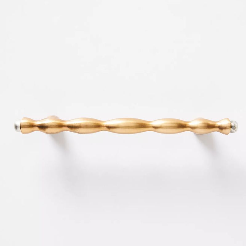 brass kitchen handle with twist detail