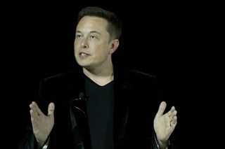 Elon Musk speaks during an event to launch the new Tesla Model X Crossover SUV on Sept. 29, 2015, in Fremont, California.