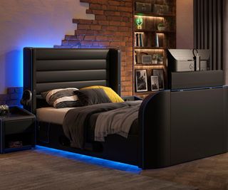 black bed with integrated tv screen and blue LED lighting