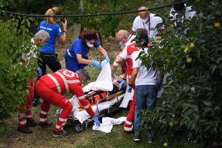American Chloe Dygert being tended to after a horrific crash at the 202 UCI Road World Championships.