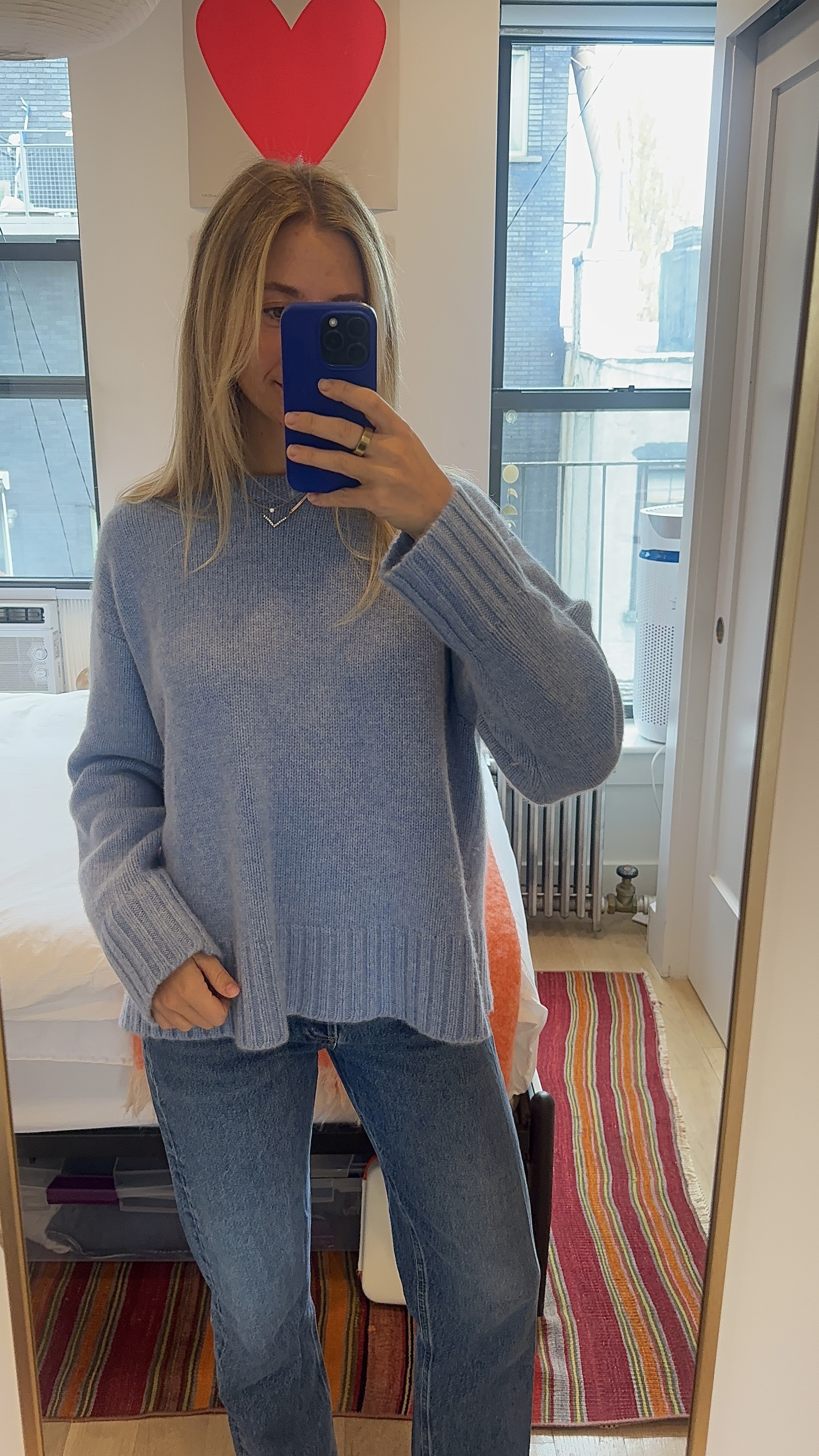 Bailey Burke in a cashmere sweater.