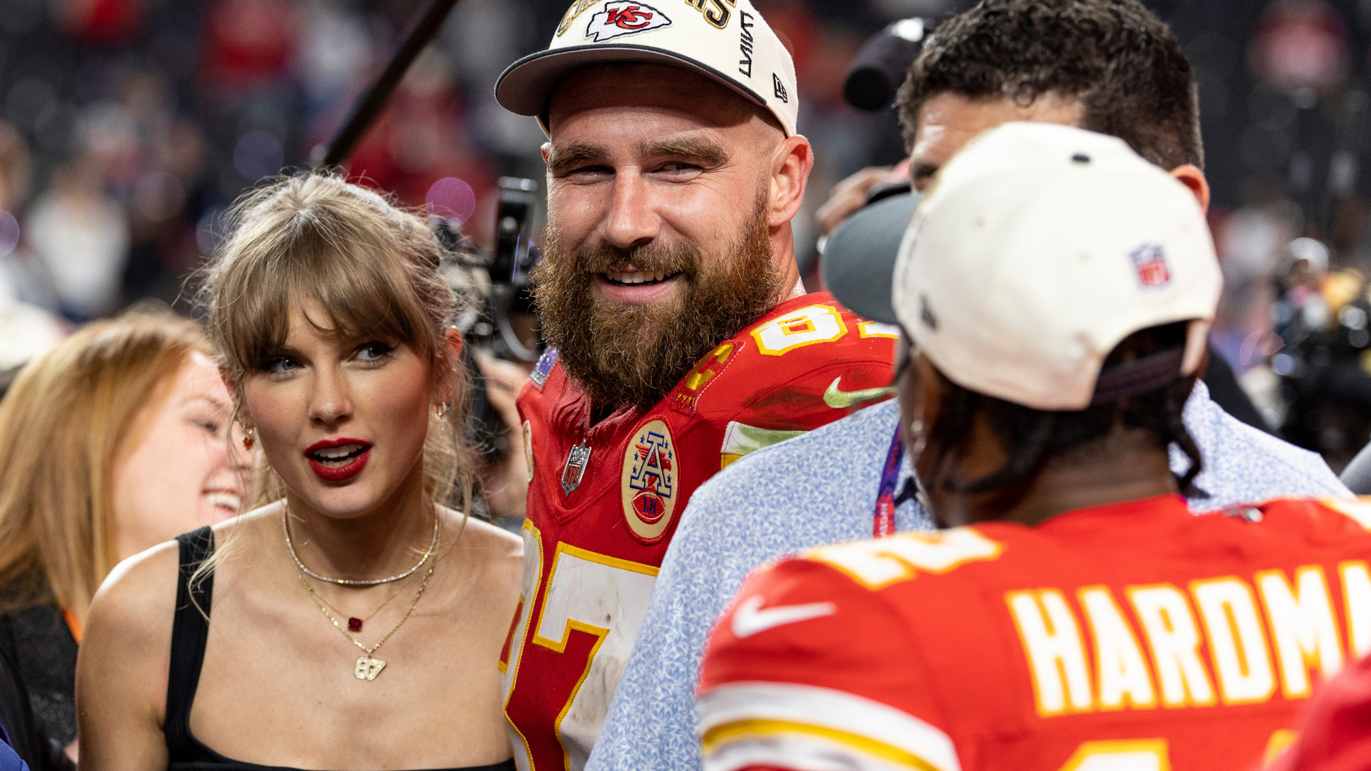 Travis Kelce #87 of the Kansas City Chiefs and Taylor Swift react as they see Mecole Hardman Jr. #12 of the Kansas City Chiefs following the NFL Super Bowl 58 football game between the San Francisco 49ers and the Kansas City Chiefs at Allegiant Stadium on February 11, 2024 in Las Vegas, Nevada