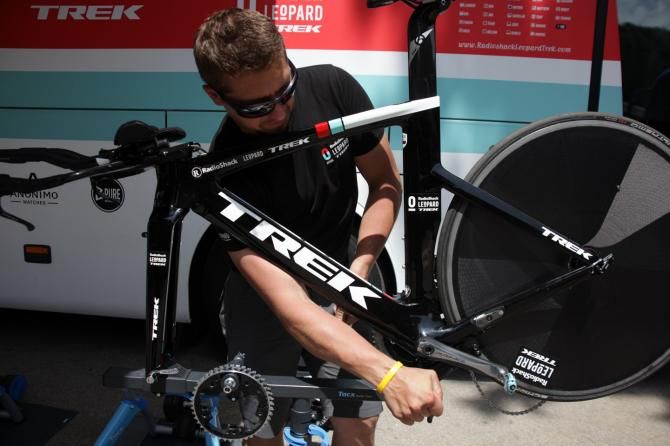 A RadioShack Leopard mechanic preps a bike for Sunday's team time trial stage at the Giro.