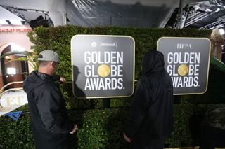 Amidst rain showers, crews set up the red carpet for the 80th Golden Globe Awards at The Beverly Hilton in Beverly Hills Monday, Jan. 9, 2023