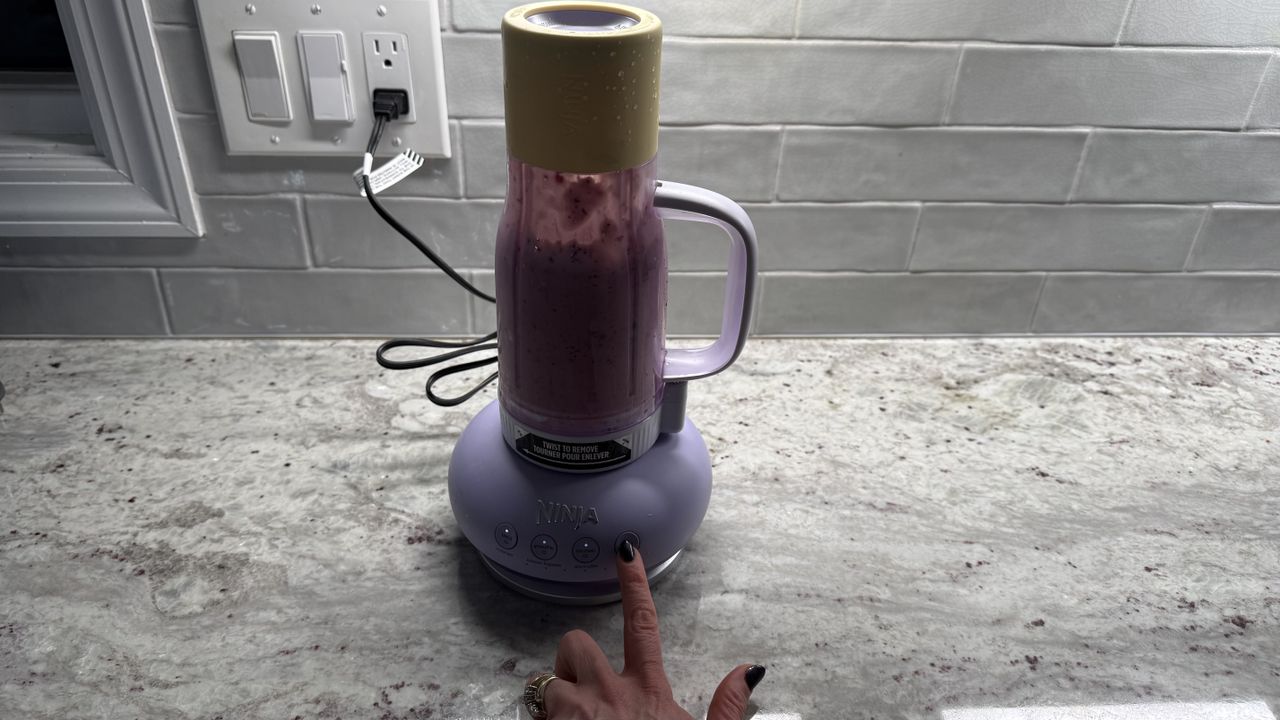 Ninja BlendBOSS&trade; Tumbler Blender with 26oz Travel Tumbler making pasta sauce