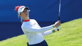 Nelly Korda plays a shot in practice for the Olympics