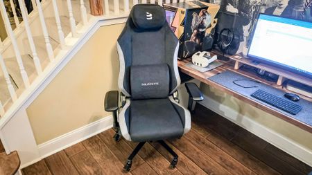 The Blacklyte Athena gaming chair in front of a desk