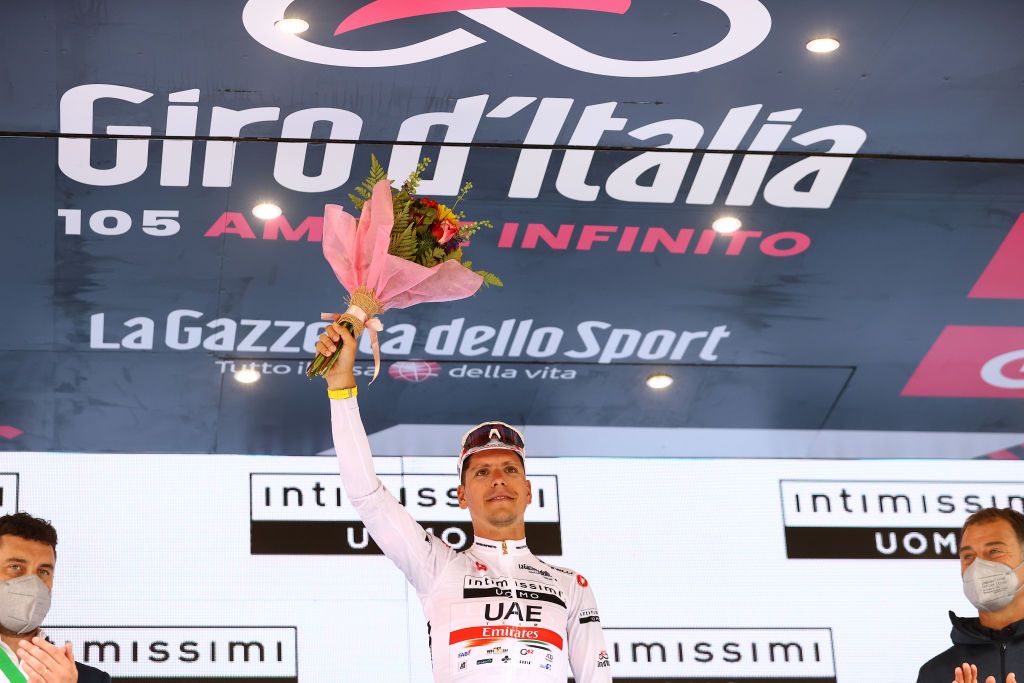 APRICA ITALY MAY 24 Joo Almeida of Portugal and UAE Team Emirates White Best Young Rider Jersey celebrates at podium during the 105th Giro dItalia 2022 Stage 16 a 202km stage from Sal to Aprica 1173m Giro WorldTour on May 24 2022 in Aprica Italy Photo by Michael SteeleGetty Images