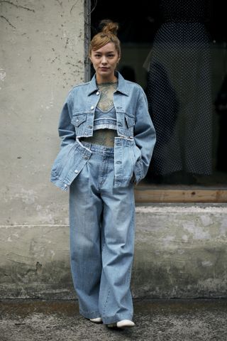 Woman wearing double denim outfit in Tokyo.