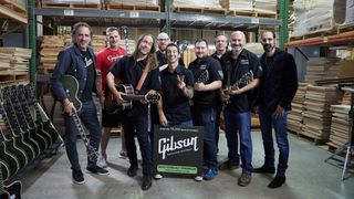 Gibson CEO with US military veterans 