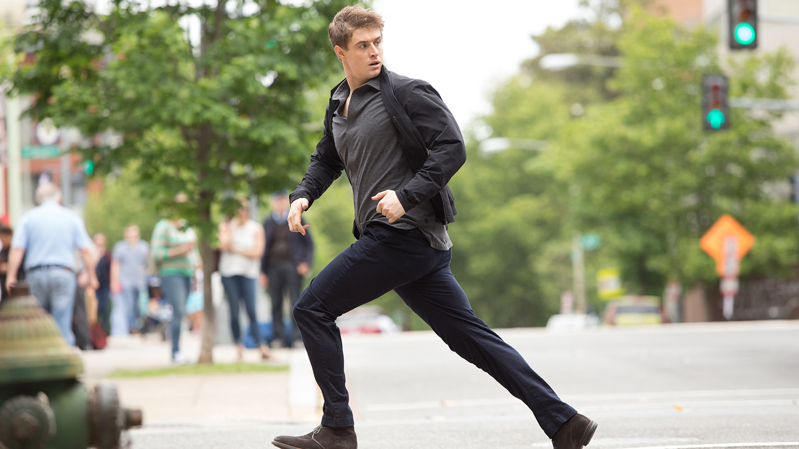 Joe Turner (Max Irons) running in a scene from thriller series, "Condor"