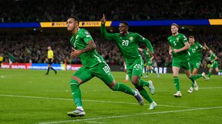 Adam Idah of Republic of Ireland, 10, celebrates with teammate Chiedozie Ogbene, 20, after scoring their side's second goal during the FIFA World Cup 2026 Group F qualifying match between Republic of Ireland and Hungary at the Aviva Stadium in Dublin.