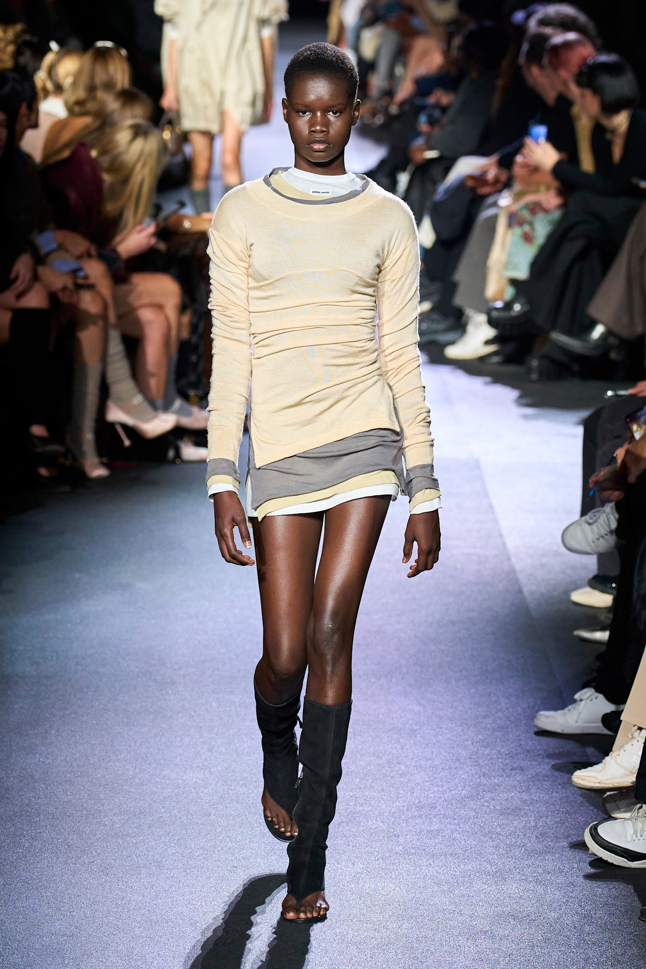 An image of long-sleeved tops on the Miu Miu spring/summer 2026 runway.