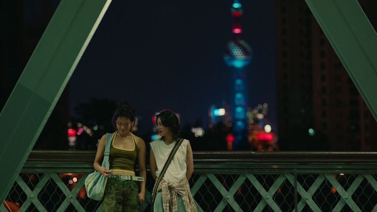 two women standing next to each other in Ephemera