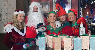 The family get into the festive spirit by donning full Christmas fancy dress as they prepare for The Vic's Christmas grotto.