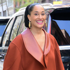 Tracee Ellis Ross is seen on April 09, 2025 in New York City wearing an orange jacket and bottega veneta heels
