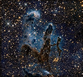 A new, infrared look at the Pillars of Creation in the Eagle Nebula.