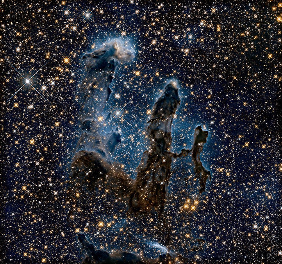 Behold! See the Hubble telescope's iconic 'Pillars of Creation' view in infrared