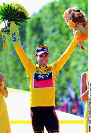 Realisation of a dream: Evans stand on the top step of the Tour de France podium in Paris.