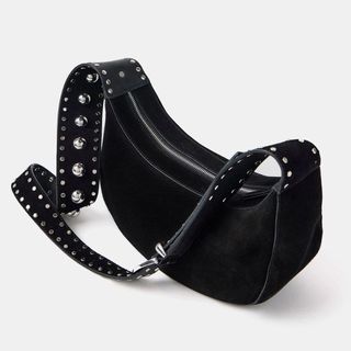 Flat lay image of a black handbag 