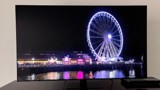 Samsung-QN95C TV showing ferris wheel onscreen