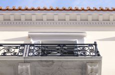 Monument Athens hotel exterior shot from ground looking up