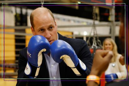 Prince William wears blue boxing gloves as he attends the 10th Anniversary Celebration of Coach Core at Copper Box Arena on October 13, 2022 in London, England
