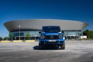 Mercedes-Benz G 580 with EQ technology in front of a contemporary building