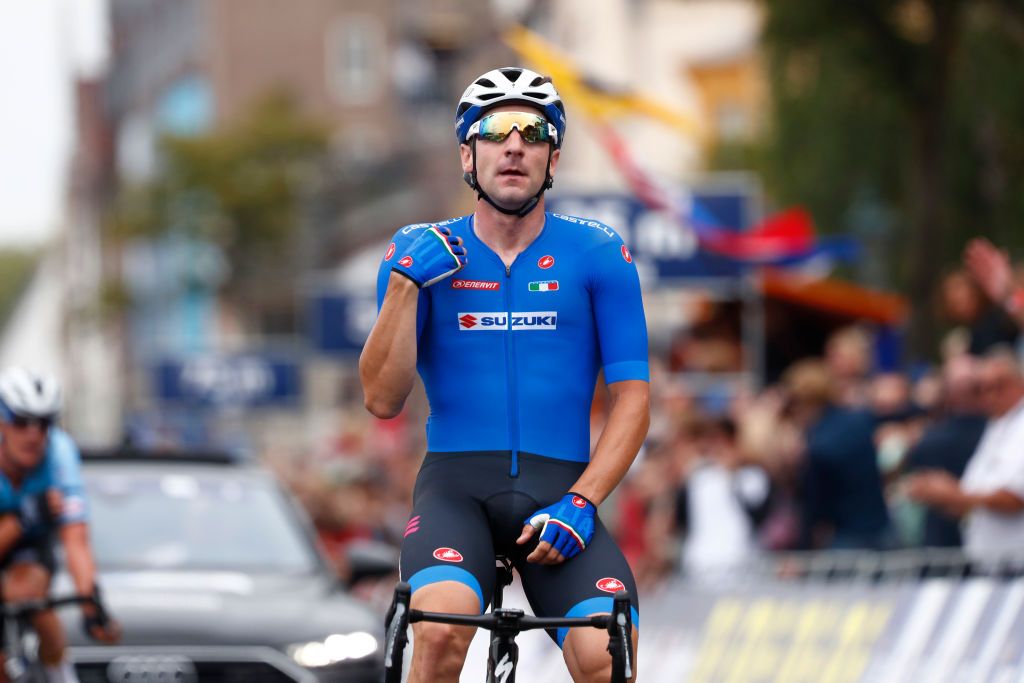 Elia Viviani (Italy) crosses himself after winning the European title
