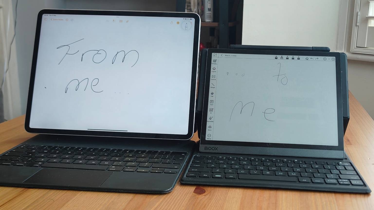 The iPad Pro 12.9 (2021) next to the Onyx Boox Tab Ultra C on a table.