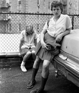 black and white images of girls in school uniform