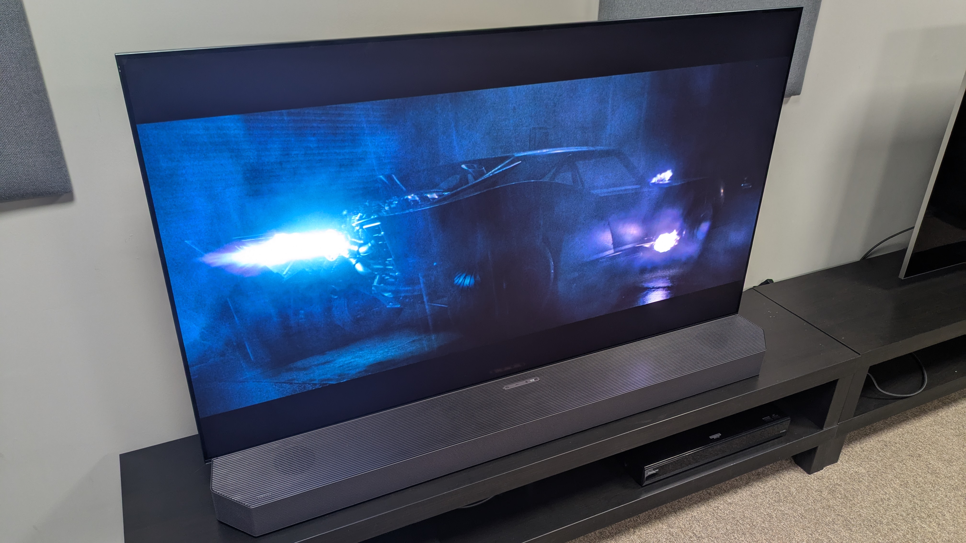 Samsung HW-Q990F soundbar connected to Samsung S95F showing The Batman on screen 