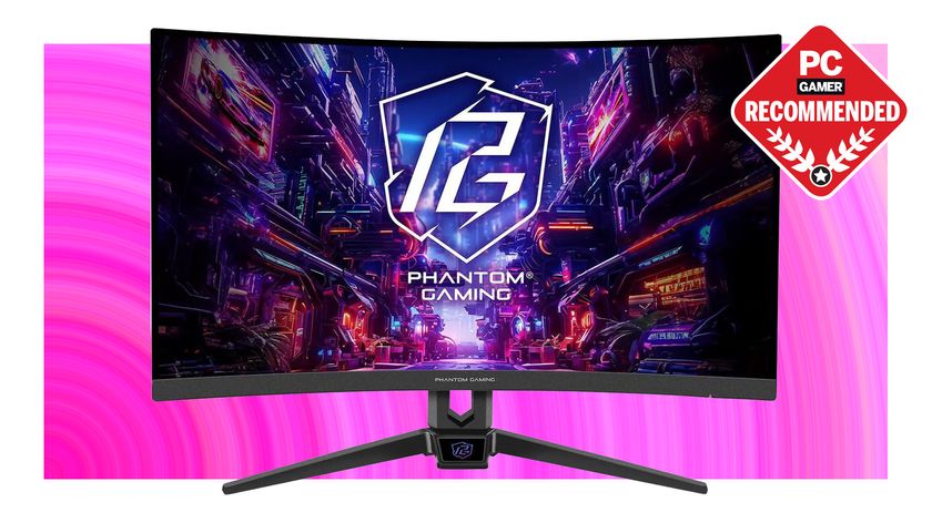 ASRock Phantom gaming monitor over the top of a pink background with the PC Gamer recommended logo in the top right.