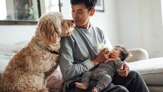 Stay-at-home dad taking care of his baby