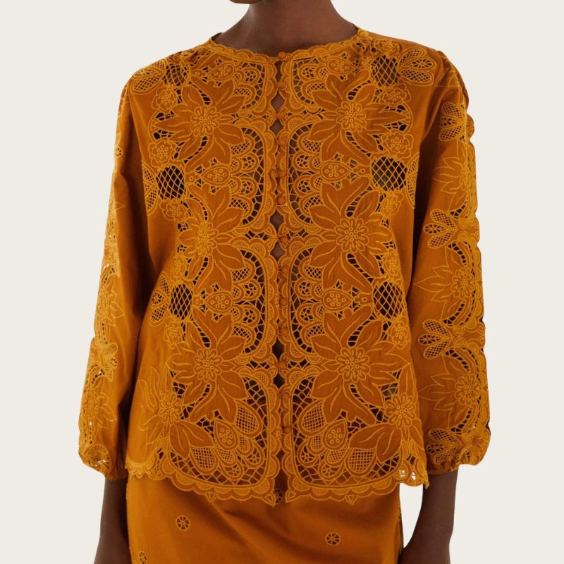 Image of orange blouse