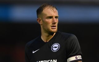 Matt Clarke of Brighton in action during the Pre-Season Friendly match between Crawley Town and Brighton and Hove Albion at The People's Pension Stadium on July 19, 2019 in Crawley, West Sussex.